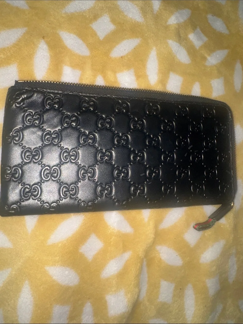 Gucci Black Embossed GG Zip Around Wallet